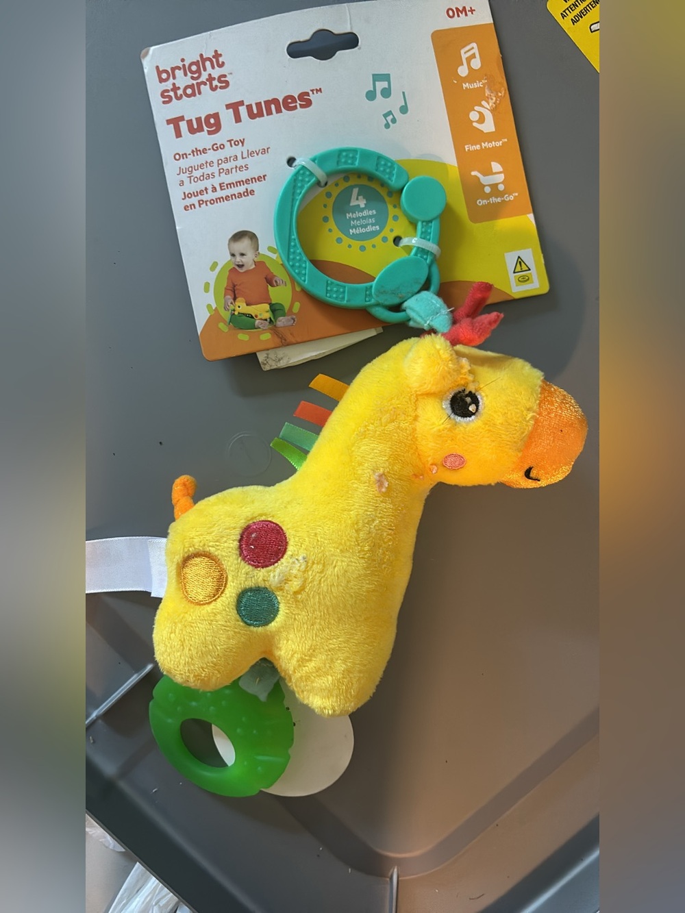 Tug Tunes Plush Giraffe Teether Toy and car seat activity bar